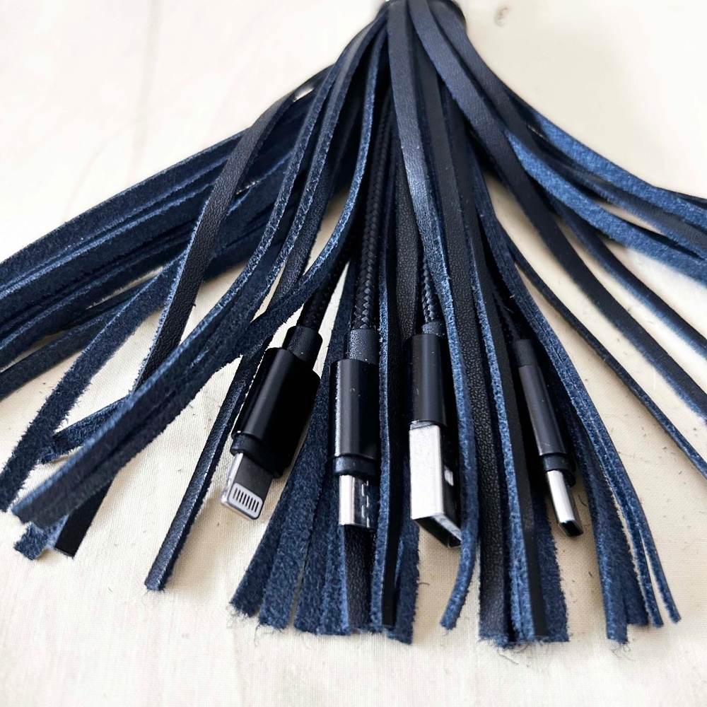 TASSLE, HAS 4 SHORT COMPUTER CABLES WITH DIFFERENT CONNECTION ENDS FOR CHARGING,